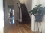 new-install-hardwood-floor-with-steps-and-rails